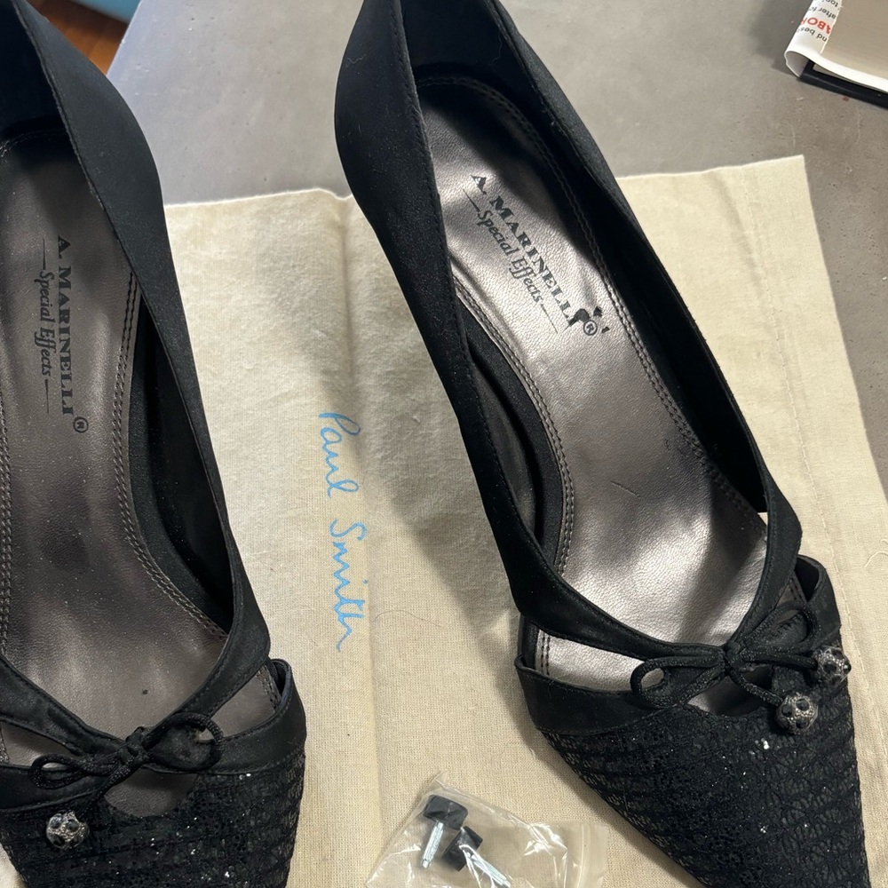 Never worn black satin / pointed toe pump